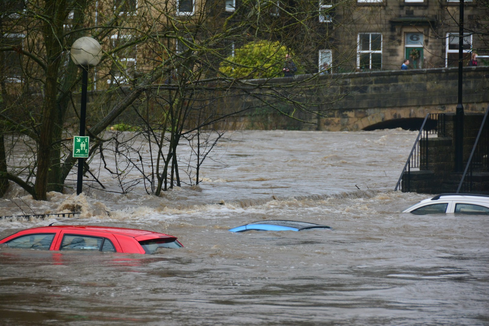 car on body of water, flood